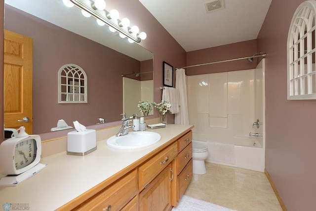 bathroom featuring visible vents, toilet, shower / tub combo with curtain, tile patterned floors, and vanity