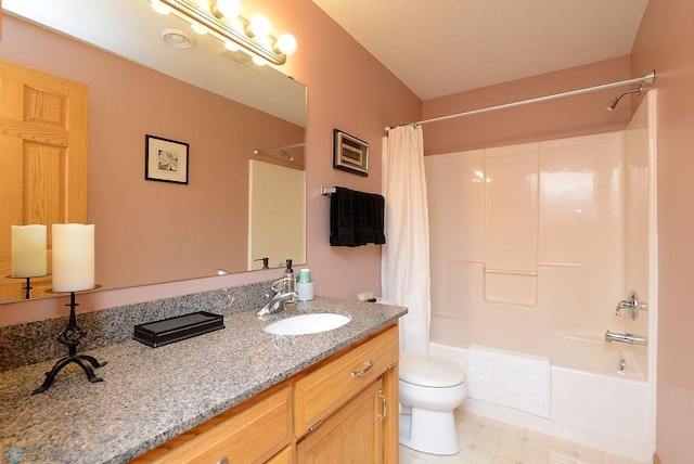 full bathroom featuring toilet, vanity, and shower / bathtub combination with curtain