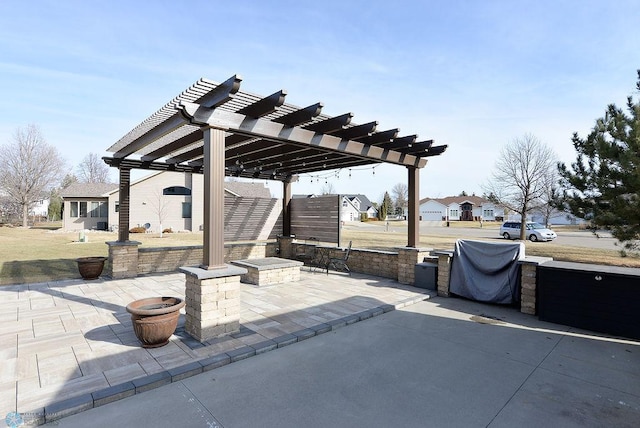 view of patio featuring a residential view and a pergola