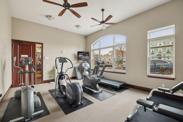 workout room featuring visible vents, baseboards, and carpet floors