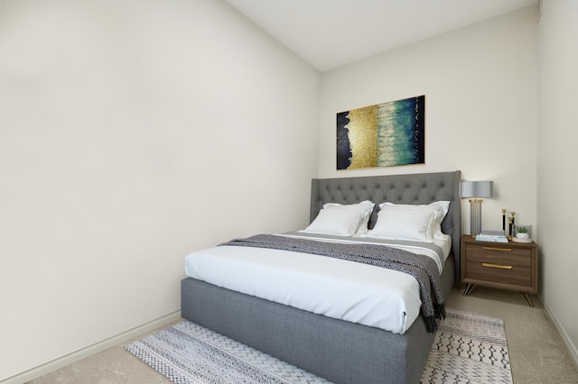 bedroom featuring baseboards and carpet floors