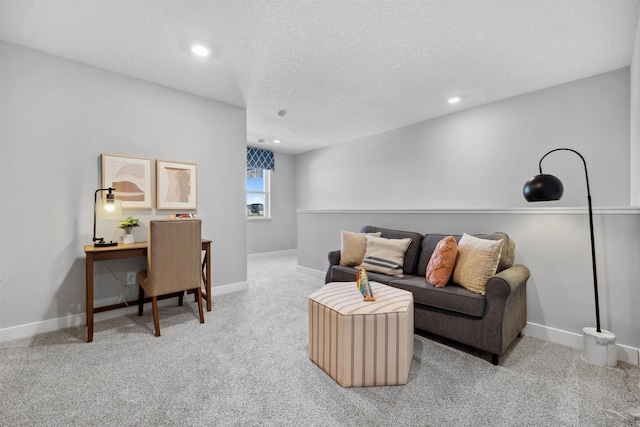 living area featuring carpet flooring, recessed lighting, a textured ceiling, and baseboards