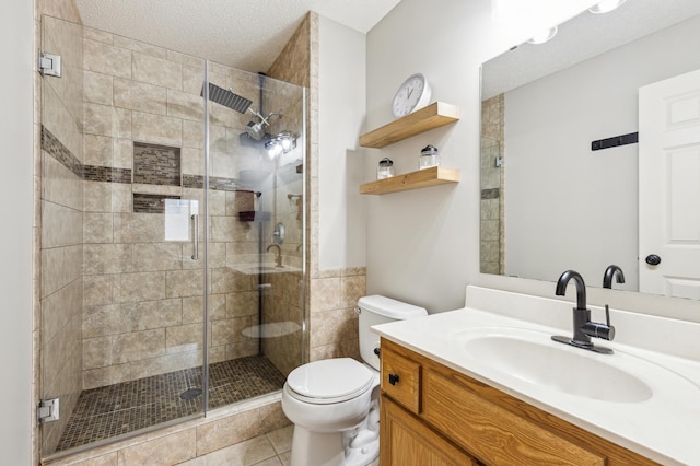 2316 Coldwater Xing, Mayer, MN 55360 - bathroom featuring vanity, toilet, a shower stall, and tile patterned floors