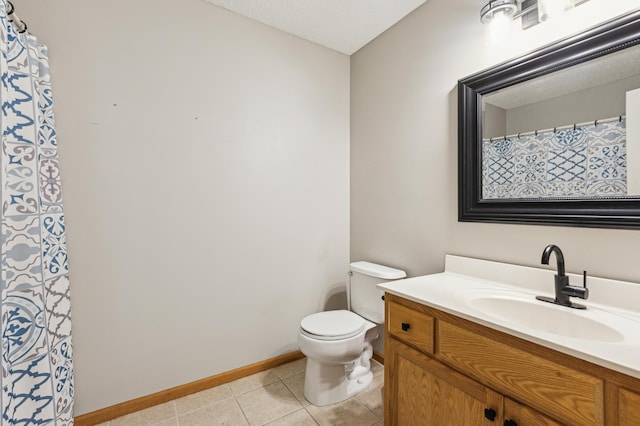2316 Coldwater Xing, Mayer, MN 55360 - full bathroom featuring vanity, toilet, tile patterned flooring, and baseboards