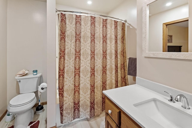 bathroom with a shower with shower curtain, recessed lighting, toilet, and vanity