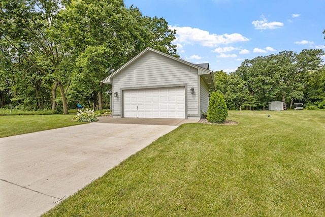 garage featuring concrete driveway