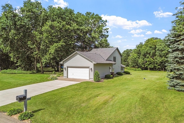 view of front of property featuring a garage, driveway, a front lawn, and roof with shingles