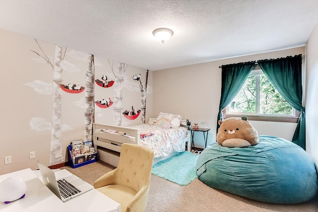 carpeted bedroom featuring a textured ceiling