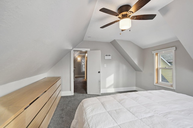 carpeted bedroom with baseboards, lofted ceiling, and ceiling fan