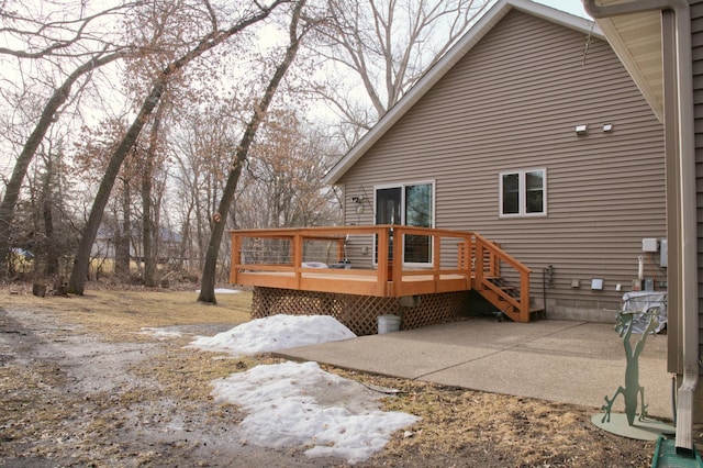 rear view of house with a patio and a deck