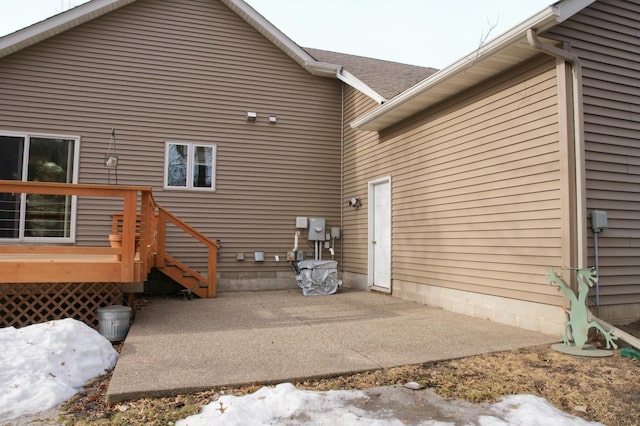 view of side of property with a patio