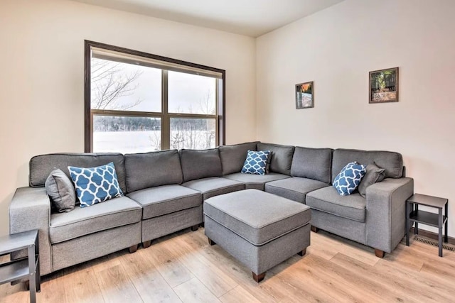 living area with light wood-style floors