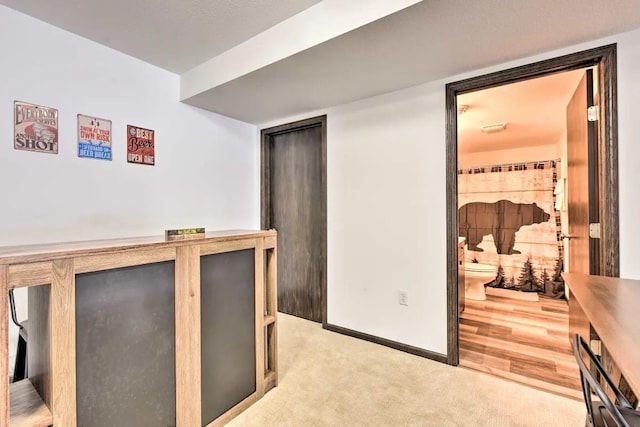 interior space with visible vents, baseboards, and carpet floors