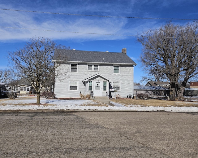 view of front of house with a chimney