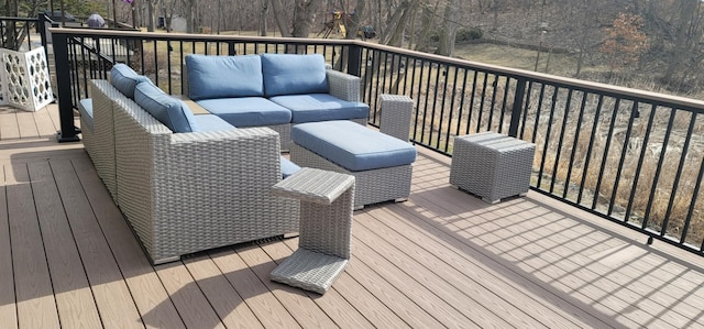 wooden deck featuring an outdoor hangout area