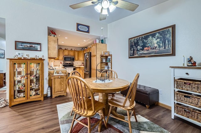 dining room featuring recessed lighting, baseboards, a ceiling fan, and dark wood-style flooring