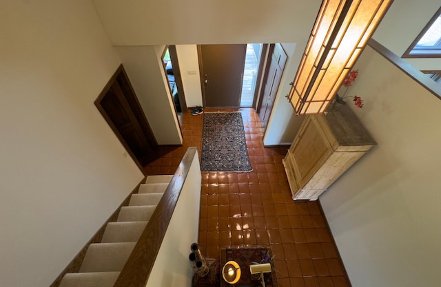 6 Crocus Ln, North Oaks, MN 55127 - staircase featuring tile patterned flooring and baseboards