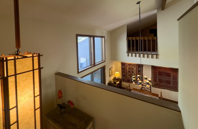 6 Crocus Ln, North Oaks, MN 55127 - staircase featuring a chandelier and vaulted ceiling