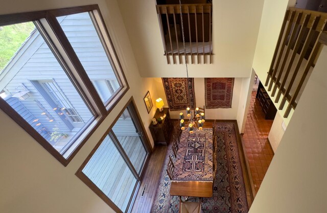 6 Crocus Ln, North Oaks, MN 55127 - foyer with a towering ceiling, a chandelier, and wood finished floors