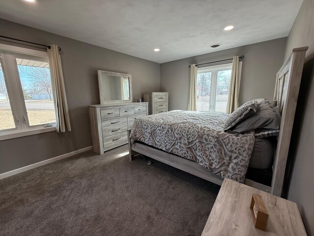 bedroom with visible vents, recessed lighting, baseboards, and dark colored carpet