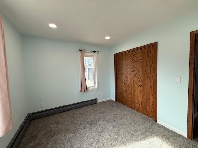 unfurnished bedroom with recessed lighting, carpet, a closet, and baseboards