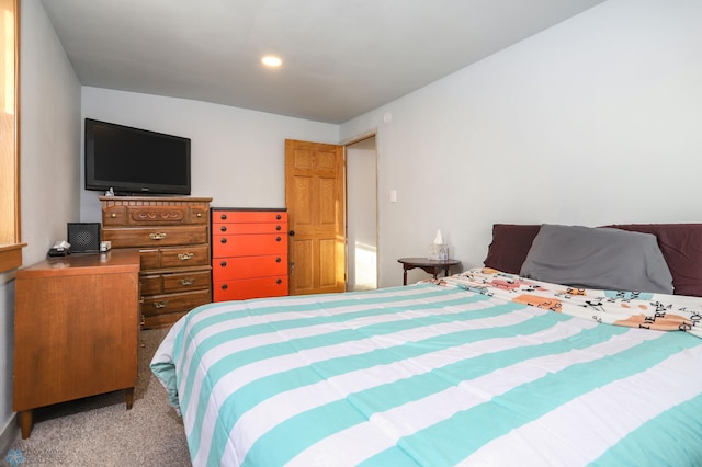 carpeted bedroom featuring recessed lighting