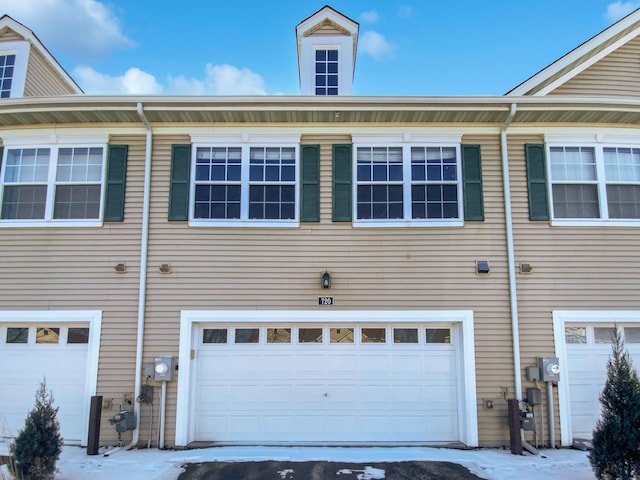 view of home's exterior with a garage