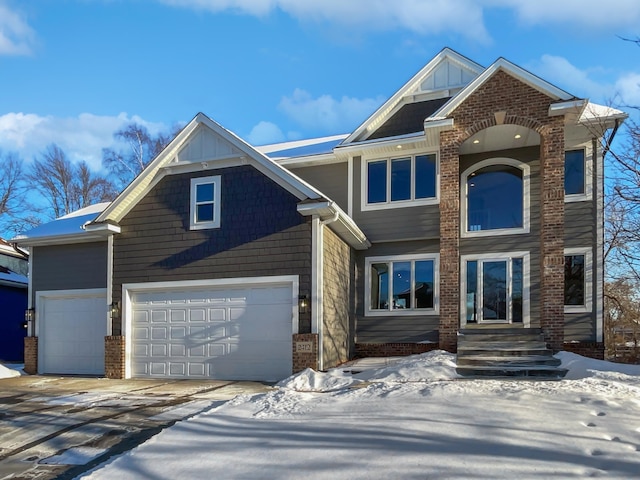 view of front facade featuring brick siding and board and batten siding