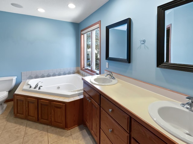 2412 132nd Ave NE, Blaine, MN 55449 - full bath with tile patterned floors, a jetted tub, toilet, and a sink