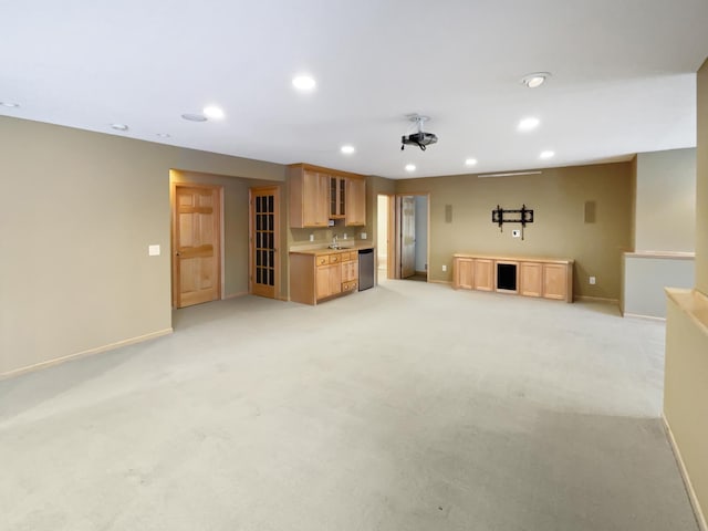 2412 132nd Ave NE, Blaine, MN 55449 - interior space featuring recessed lighting, light colored carpet, baseboards, and a sink