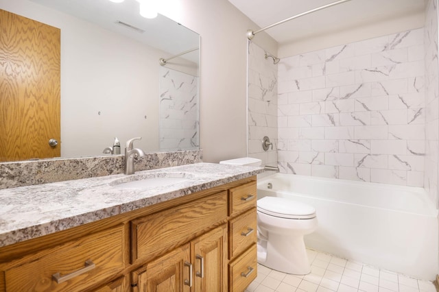 bathroom featuring vanity, toilet, tub / shower combination, and visible vents