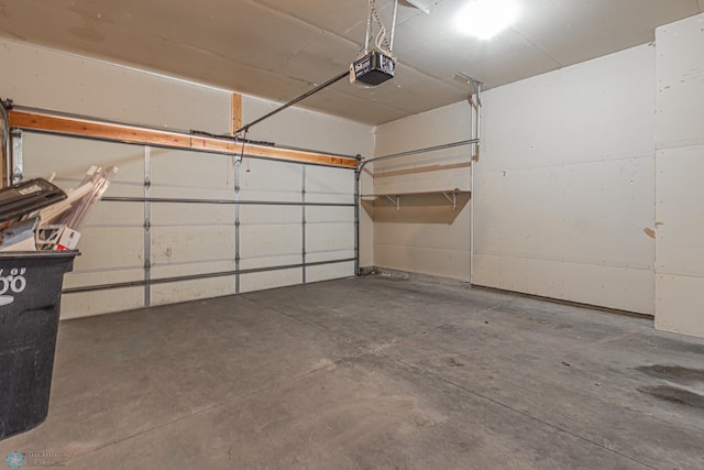 garage featuring a garage door opener