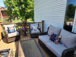 deck featuring outdoor lounge area