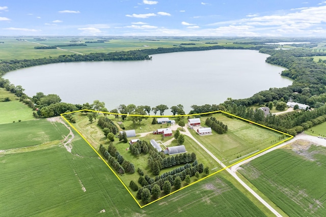 drone / aerial view featuring a rural view and a water view