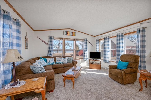 living area with plenty of natural light, carpet, crown molding, and vaulted ceiling