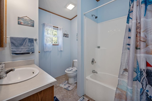 full bath featuring toilet, ornamental molding, vanity, and shower / bath combination with curtain