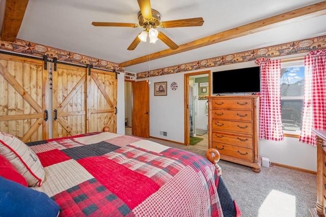 570 190th Ave, Fairmont, MN 56031 - bedroom featuring baseboards, carpet flooring, a barn door, beamed ceiling, and a ceiling fan