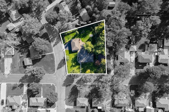 birds eye view of property with a residential view