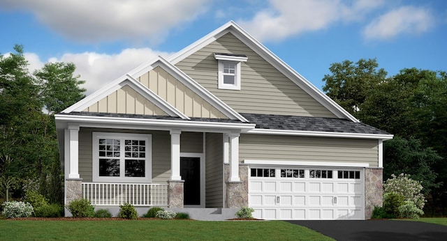 craftsman-style house featuring aphalt driveway, stone siding, covered porch, board and batten siding, and a shingled roof