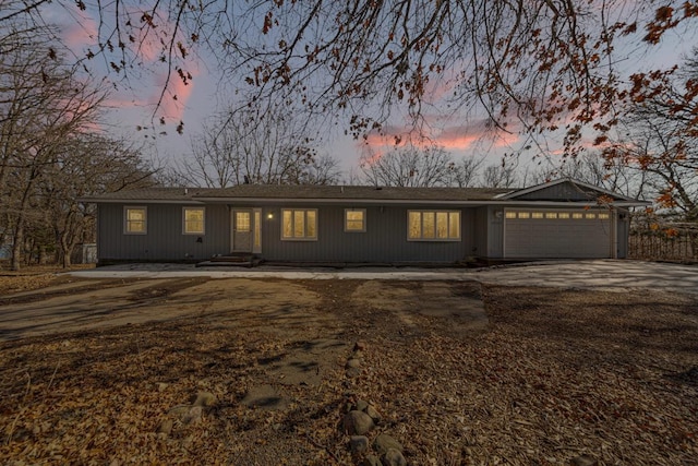 view of front of house with a garage and driveway