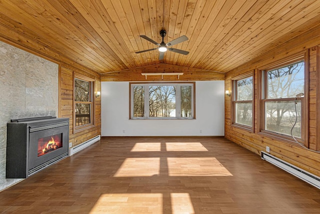 unfurnished sunroom with wooden ceiling, a ceiling fan, lofted ceiling, and a baseboard radiator