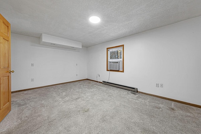 unfurnished room featuring baseboards, carpet, cooling unit, a textured ceiling, and a baseboard radiator