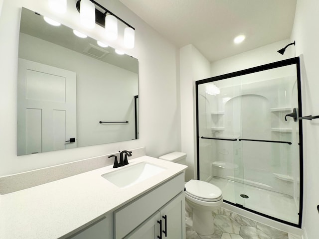 bathroom featuring visible vents, marble finish floor, a stall shower, and toilet