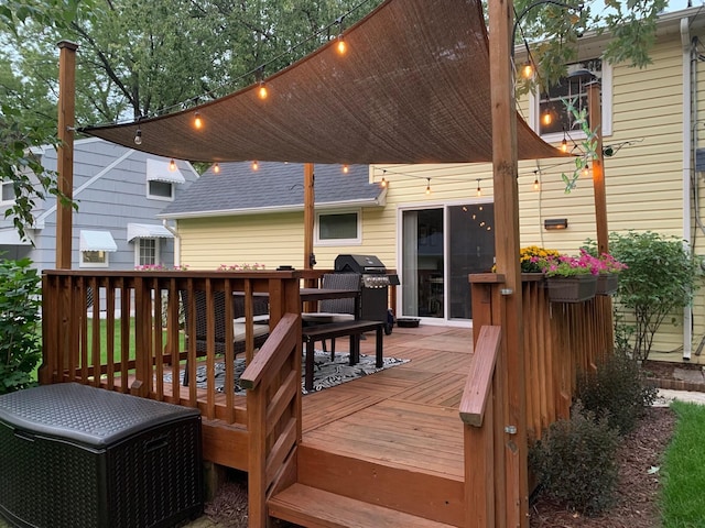 wooden terrace featuring grilling area