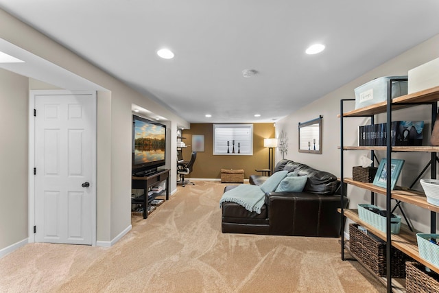 living room with recessed lighting, baseboards, and carpet