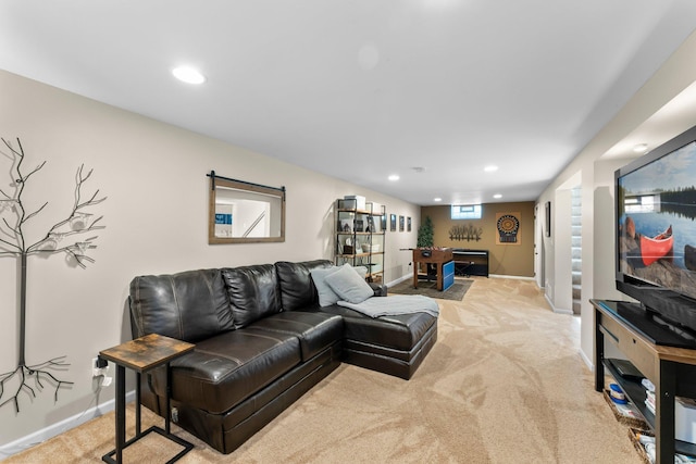 carpeted living room with recessed lighting and baseboards