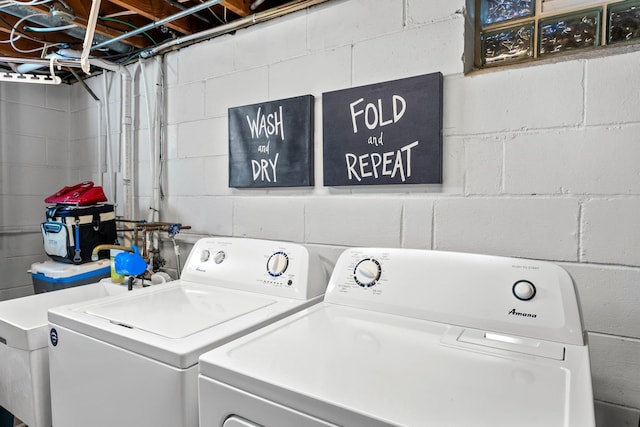 laundry area with laundry area and independent washer and dryer