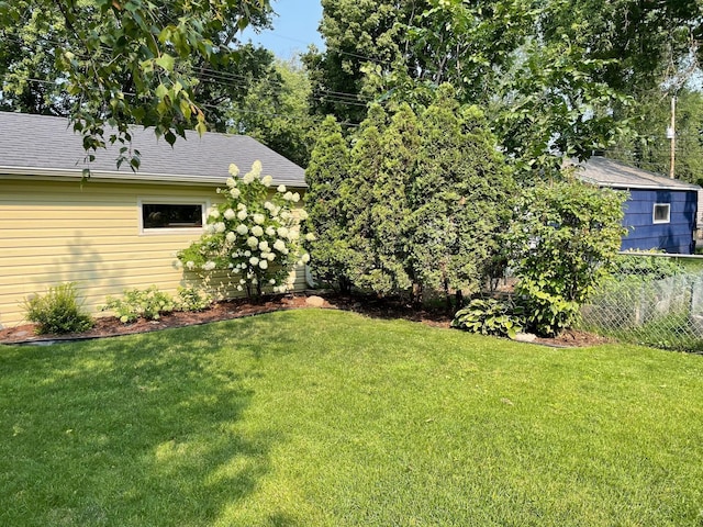 view of yard featuring fence