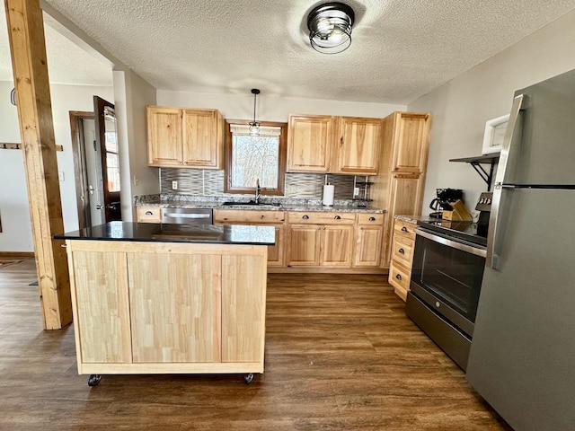 28887 Hi Vista Dr, Otter Tail Twp, MN 56515 - kitchen featuring light brown cabinets, stainless steel appliances, a sink, dark wood-type flooring, and a textured ceiling