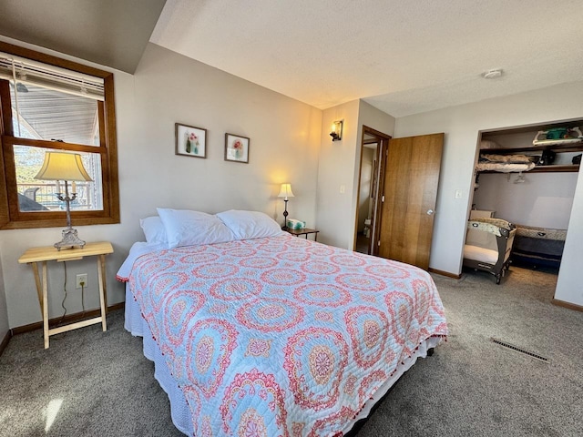 28887 Hi Vista Dr, Otter Tail Twp, MN 56515 - carpeted bedroom with baseboards, a closet, and a walk in closet